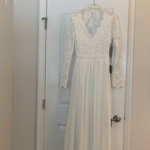 Lulus white full length dress, never worn. Still with tags on. Open back.